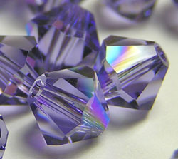  swarovski 5328 tanzanite ab 6mm bicone bead 
