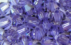  swarovski 5328 4mm tanzanite bicone bead 