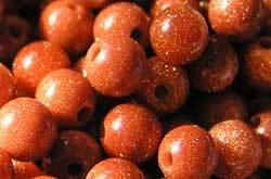  strings of goldstone 4mm (very variable) round beads - approx 105 per strand 