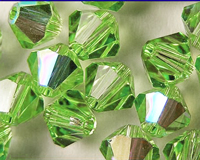  swarovski 5328 4mm peridot ab bicone bead 