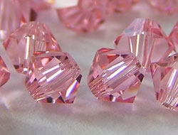  swarovski 5328 light rose 6mm bicone bead 