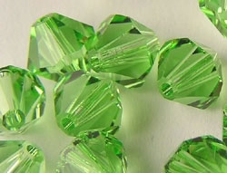  swarovski 5328 8mm peridot bicone bead 