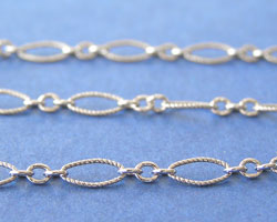  sterling silver 7.5mm oval + 2mm round long & short textured antiqued chain, long links are 7.5mm x 3.5mm,  short links are 2mm, there are x3 short links dividing the long links - sold per inch *sold per cm - 5 units is 5cm, 100 units is 100cm=1 meter* 