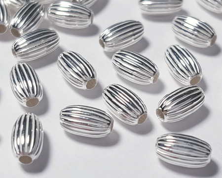 <16g/100> sterling silver 6.7mm x 4mm corrugated oval bead, 1.5mm hole 