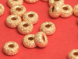  <5.35/100> vermeil 3mm x 1.5mm laser cut rondelle bead, 1.1mm hole [vermeil is gold plated sterling silver] 