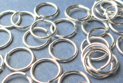  sterling silver 7mm diameter, 21 gauge (approx 0.76mm), open jump ring (saw cut) 