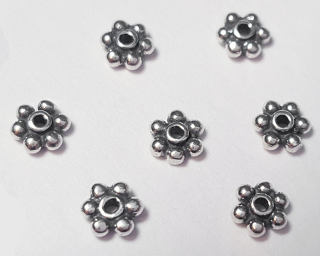  sterling silver 3.5mm daisy spacer, slightly puffed, with flattened polished sides, very pretty 