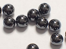 hematite 6.5mm half drilled rounds, 1mm hole