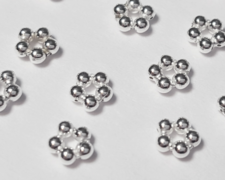  *NEW LOWER PRICE* sterling silver small 3.7mm x 1.6mm penta / daisy spacer, 0.85mm hole 