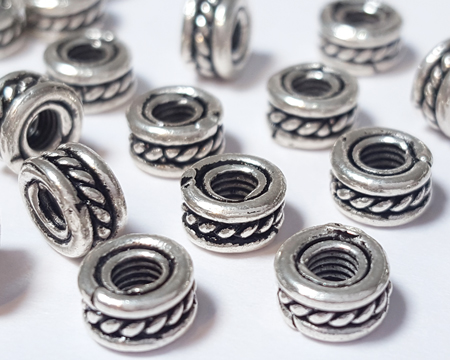  sterling silver 6mm wire-work rondelle / tyre bead with central 'rope' detail, 2mm hole 