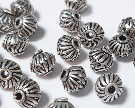  sterling silver 6mm wirework nearly round bead with top and bottom collar and 1.3mm hole 