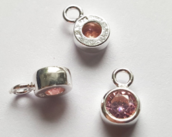  ** NEW LOWER PRICE ** sterling silver, stamped 925, 8.35mm x 5.15mm drop / charm containing a 4mm rose cubic zironia, very nicely made, has closed jumpring attached at the top with internal diameter of 1.5mm 