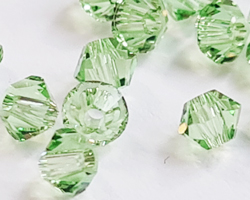  swarovski 5328 3mm peridot bicone bead 