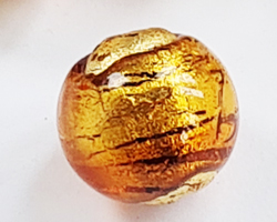 --CLEARANCE-- venetian murano topaz glass with swirls of 24k gold foil 14mm round bead *** QUANTITY IN STOCK =24 ***