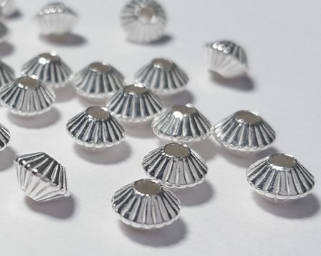 <16.5g/100> sterling silver 5.5mm corrugated bicone spacer bead, 1.7mm hole